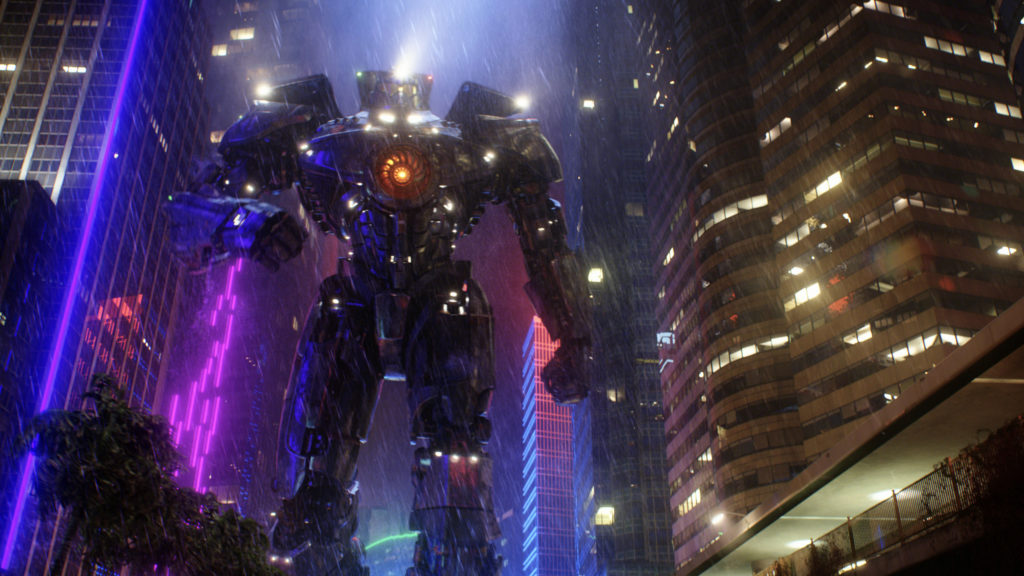 This film publicity image released by Warner Bros. Pictures shows the Gipsy Danger robot in a scene from "Pacific Rim." "Pacific Rim" fulfills a very basic boyhood fantasy: big ol' robots and giant monsters slugging it out. The concept to Guillermo del Toro's "Godzilla"-sized film is about as simple as it gets, but actually constructing such mammoth creations is a far more arduous undertaking. (AP Photo/Warner Bros. Pictures)